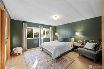 Luxurious, cozy main bedroom will have you sleeping well, in style.