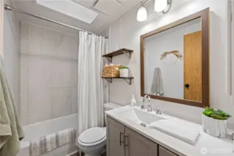 Fully appointed hall bathroom.