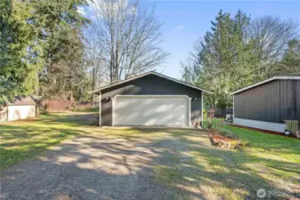 HUGE oversized detached garage/shop with room for EVERYTHING!