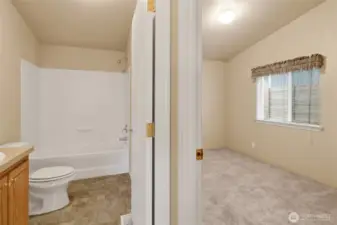 Full bathroom adjacent to the 2nd bedroom.