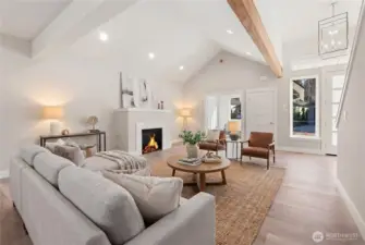 Luxury vinyl plank flooring (very good for pets and wear). Entrance closet for shoes and coats. Office with French doors off the living room. (Photo is staged).