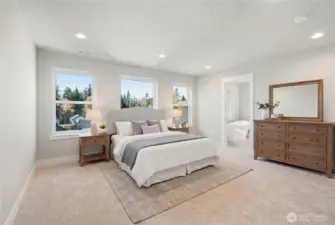 This home has 2 primary suites! One on each level. This is the upstairs Primary Suite - complete with a primary bathroom and walk-in closet. Large room, large windows for natural light!