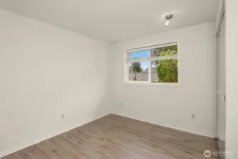 Bedroom #4 looks out to the front yard.