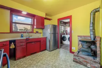 Kitchen space that leads to laundry area on main floor