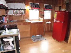 Cute Retro kitchen with Brand new stove, Fridge, Microwave and Toaster.