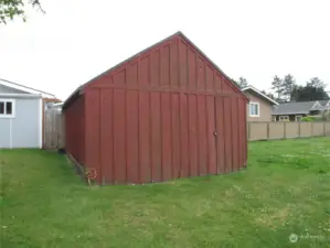 Large storage shed for lawn tools and Beach Toys.