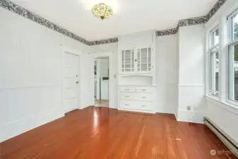 Big formal dining room with original built-in cabinets.