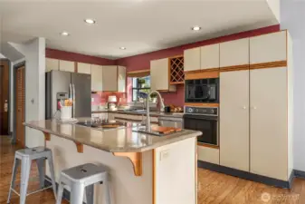 There is plenty of cabinet and counter space.  Enjoy the breakfast bar or just gather for conversational cooking.