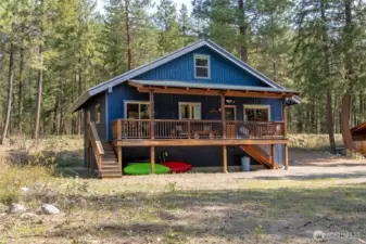 Vintage Cabin Charm with Modern Touches  Built in the 1970s and lovingly maintained, this 2BD/1.5BA home features classic pine finishes, a cozy covered deck, and thoughtful updates like a Trex deck and covered porch — all nestled in the pines with river just steps away.