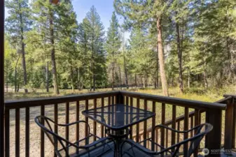 Coffee. Conversation. Forest Views.  Step right outside the bedroom onto your private deck nook—perfect for morning coffee, reading in the shade, or winding down to birdsong and pine-scented breezes.