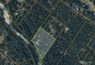 Property Aerial Map  5.01 forested acres along the Methow River, outlined here for clarity. Enjoy privacy, access to trails, and views in every direction—your own slice of Mazama heaven.