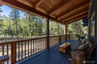 Covered River-View Deck  Relax year-round on this spacious Trex deck , surrounded by forest and beautiful river views. The perfect perch for morning coffee, reading, or evening conversations under the pines.
