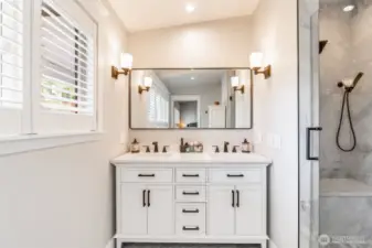 En-suite bathroom with heated floors, dual sinks and walk in shower. Lots of natural light and vaulted ceiling.