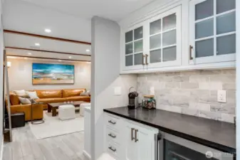 Entertaining bar for fun entertaining with beverage refrigerator and soapstone countertop.