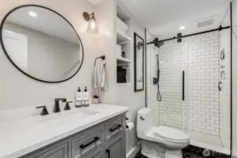 Lower level bathroom with walk-in shower.