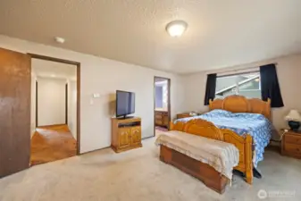 Main House:  Spacious Primary Bedroom with en suite