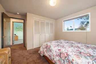 Main House:  Generous size guest bedroom with large closet