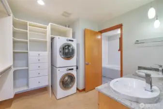 Walk-in closet, double vanity and laundry.