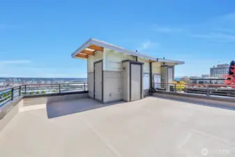 Roof tower and individual rooftop deck with Bronze Dec Tec membrane, cedar accent metal rails and natural gas stub available for BBQ. Wonderful outdoor space for entertaining.