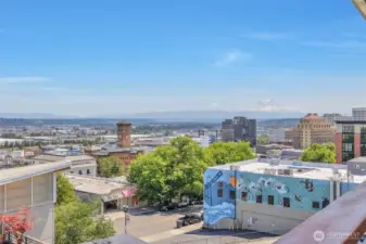 City and Mt Rainier views from rooftop deck.