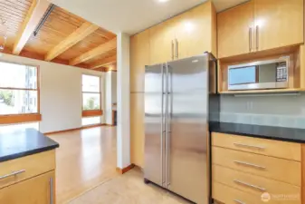 Open kitchen design connects the kitchen to the main living area providing a spacious and social feel.