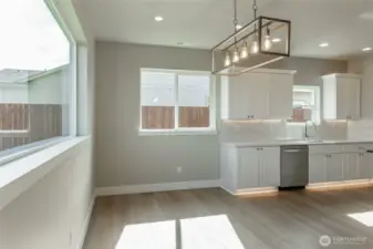 Large open dining room area with plenty of light, like home