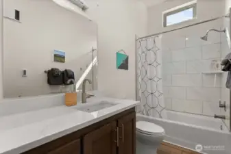 Main bathroom; full bathroom with elegant tilework – Clean lines and energy-efficient fixtures in both baths.