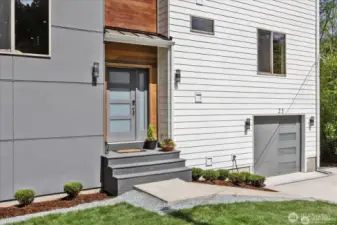 The entryway offers custom wood accents for a Pacific Northwest feel.