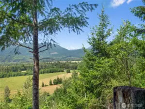View of Mt. Rainier from camp site. Photos are representative of the overall property and may not reflect the unique features of each individual lot.