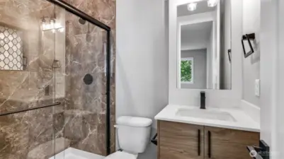 Convenient and private 3/4 Bath that's dedicated for the Guest Suite.