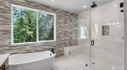 Tile work on the accent wall goes all the way to the ceiling just like the rest of the house.