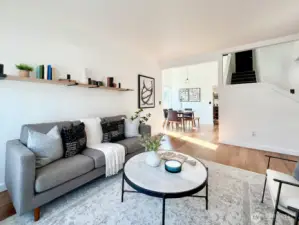 Living room opens to formal dining.