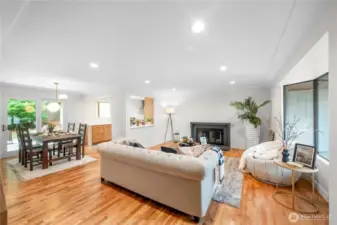 Recessed lighting, fireplace and bay window