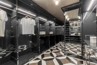 If we had more spaces for photos, we would show the back half of this massive dressing room. How many gowns, handbags, kicks, watches, etc. could you store here, under the classic art-deco fixtures? Let's find out.