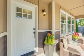 Catch some south facing sun rays on the front porch! Charming curb appeal and thoughtful upgrades throughout—your new home awaits!