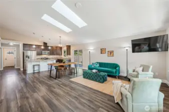 Vaulted ceiling and 2 skylights brightens the living/dining/kitchen area beautifully!