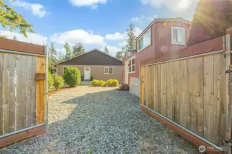 Wide gates that open to back alley. RV parking.