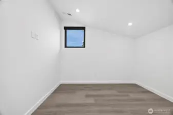 The second bedroom is nicely sized and has a westerly facing window.