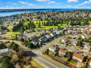 Home is in foreground, North Shore Golf and Puget Sound in background.
