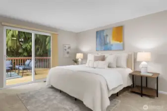 Enjoy great views from the primary bedroom, which opens to the deck.