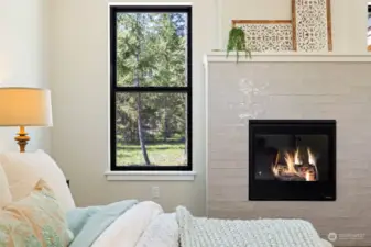 Primary Suite with cozy fireplace