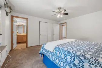 Primary bedroom and bathroom