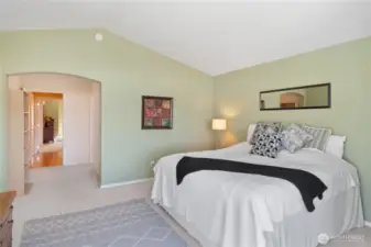 A serene Primary Bedroom with large connected Bathroom.