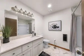 Full bath, recently updated. Next to the bedrooms.