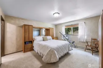 Nice sized primary bedroom, with a three quarter bath attached.