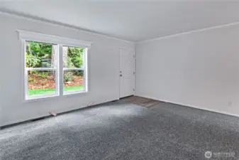 Oversized open living room welcomes you in.