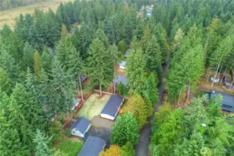Drone photo overhead of home site.