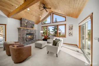 Great room with vaulted ceilings and cozy fireplace