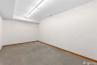Extra garage space with heated floors in shop