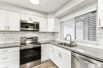Plenty of cabinetry in this beautiful kitchen.